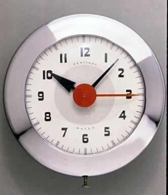 Henry Dreyfuss (American, 1904-1972). <em>Wafer Clock, Model SK 174</em>, ca. 1940. Metal, glass, 7 1/2 x 7 1/8 x 2 3/4 in. (19.1 x 18.1 x 7 cm). Brooklyn Museum, Gift of Eva, Alan, and Louis Brill, 1998.143.5. Creative Commons-BY (Photo: Brooklyn Museum, CUR.1998.143.5.jpg)