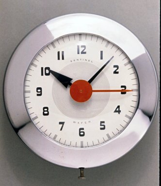 Henry Dreyfuss (American, 1904–1972). <em>Wafer Clock, Model SK 174</em>, ca. 1940. Metal, glass, 7 1/2 x 7 1/8 x 2 3/4 in. (19.1 x 18.1 x 7 cm). Brooklyn Museum, Gift of Eva, Alan, and Louis Brill, 1998.143.5. Creative Commons-BY (Photo: Brooklyn Museum, CUR.1998.143.5.jpg)