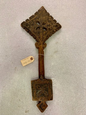 Amhara. <em>Hand Cross (mäsqäl)</em>, early 17th century. Wood, pigment, 21 1/2 x 8 3/4 x 1 1/4 in.  (54.6 x 22.2 x 3.2 cm). Brooklyn Museum, Gift of Eric Goode, 1998.173.1. Creative Commons-BY (Photo: , CUR.1998.173.1_view01.jpg)