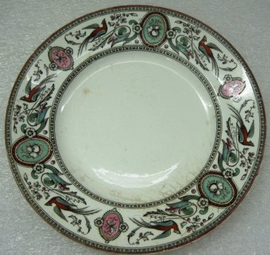 Ridgway, Sparks, & Ridgway. <em>Plate, Chelsea Pattern</em>, 1875-1879; Patented May 31 1875. Glazed earthenware, 1 x 8 3/8 x 8 3/8 in.  (2.5 x 21.3 x 21.3 cm). Brooklyn Museum, Gift of Jason and Susanna Berger, 1999.103.27. Creative Commons-BY (Photo: Brooklyn Museum, CUR.1999.103.27.jpg)