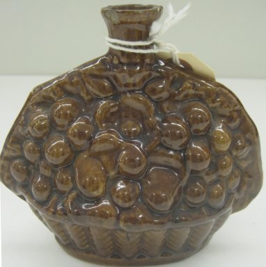Unknown. <em>Flask</em>, 19th or 20th century. Glazed earthenware, 5 1/4 x 5 1/2 x 2 3/4 in. (13.3 x 14 x 7 cm). Brooklyn Museum, Gift of Paul F. Walter, 1999.108.18. Creative Commons-BY (Photo: Brooklyn Museum, CUR.1999.108.18.jpg)