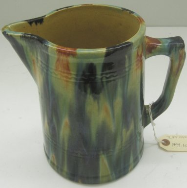 Unknown. <em>Pitcher</em>, 19th or 20th century. Glazed earthenware, 8 1/2 x 9 x 5 1/2 in. (21.6 x 22.9 x 14 cm). Brooklyn Museum, Gift of Paul F. Walter, 1999.108.5. Creative Commons-BY (Photo: Brooklyn Museum, CUR.1999.108.5.jpg)