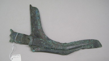 Dian. <em>Dagger-Axe or Halberd with Whorl Decoration</em>, 5th century B.C.E.-early 1st century C.E. Bronze, 12 x 6 in.  (30.5 x 15.2 cm). Brooklyn Museum, Anonymous gift, 1999.134.4 (Photo: , CUR.1999.134.4.jpg)