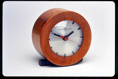 Gilbert Rohde (American, 1894–1944). <em>Clock, Model 6332</em>, ca. 1933. Wood, metal, glass, 4 x 3 7/8 x 2 1/4 in. (10.2 x 9.8 x 5.7 cm). Brooklyn Museum, Gift of Paul F. Walter, 1999.141.2. Creative Commons-BY (Photo: Brooklyn Museum, CUR.1999.141.2.jpg)