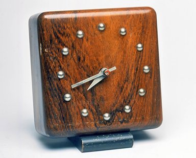 Gilbert Rohde (American, 1894–1944). <em>Clock</em>, ca. 1933. Wood, metal, 5 1/4 x 4 3/4 x 3 in. (13.3 x 12.1 x 7.6 cm). Brooklyn Museum, Gift of Paul F. Walter, 1999.141.3. Creative Commons-BY (Photo: Brooklyn Museum, CUR.1999.141.3.jpg)