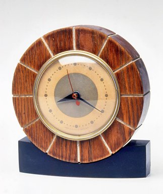 Howard Miller Clock Co. (founded 1926). <em>Clock</em>, ca. 1935. Metal, wood and glass, 6 3/4 x 6 x 1 7/8 in.  (17.1 x 15.2 x 4.8 cm). Brooklyn Museum, Gift of Paul F. Walter, 1999.141.7. Creative Commons-BY (Photo: Brooklyn Museum, CUR.1999.141.7.jpg)