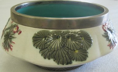 Josiah Wedgwood & Sons Ltd. (founded 1759). <em>Bowl, Argenta Pattern</em>, ca. 1885. Glazed Earthenware, Silverplate, 4 1/2 x 9 3/4 x 9 3/4 in. (11.4 x 24.8 x 24.8 cm). Brooklyn Museum, Gift of the Estate of Harold S. Keller, 1999.152.253. Creative Commons-BY (Photo: Brooklyn Museum, CUR.1999.152.253_view1.jpg)