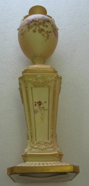 Worcester Royal Porcelain Co. (founded 1751). <em>Vase on Pedestal</em>, 1897. Porcelain, 17 1/2 x 4 1/2 x 4 1/2 in. (44.5 x 11.4 x 11.4 cm). Brooklyn Museum, Gift of the Estate of Harold S. Keller, 1999.152.270. Creative Commons-BY (Photo: Brooklyn Museum, CUR.1999.152.270_view3.jpg)
