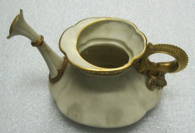 Worcester Royal Porcelain Co. (founded 1751). <em>Watering Can</em>, 1897. Porcelain, 6 1/8 x 9 1/2 x 6 1/4 in. (15.6 x 24.1 x 15.9 cm). Brooklyn Museum, Gift of the Estate of Harold S. Keller, 1999.152.288. Creative Commons-BY (Photo: Brooklyn Museum, CUR.1999.152.288.jpg)