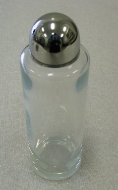 Ettore Sottsass Jr. (Italian, born Austria, 1917-2007). <em>Oil Bottle</em>, Designed 1978. Glass and stainless steel, 16.5 x 5.2 cm. Brooklyn Museum, Gift of Alessi S.p.A., 1999.40.17. Creative Commons-BY (Photo: Brooklyn Museum, CUR.1999.40.17.jpg)