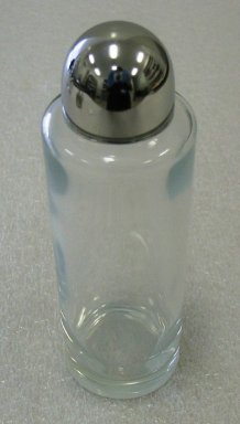 Ettore Sottsass Jr. (Italian, born Austria, 1917-2007). <em>Vinegar Bottle</em>, Designed 1978. Glass and stainless steel, 16.5 x 5.2 cm. Brooklyn Museum, Gift of Alessi S.p.A., 1999.40.18. Creative Commons-BY (Photo: Brooklyn Museum, CUR.1999.40.18.jpg)