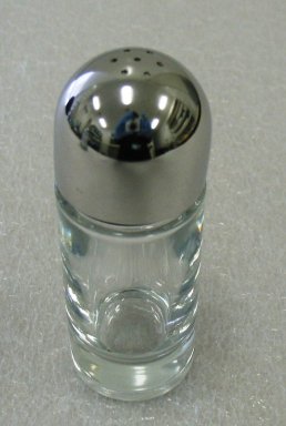 Ettore Sottsass Jr. (Italian, born Austria, 1917-2007). <em>Salt Shaker</em>, Designed 1978. Glass and stainless steel, 10.0 x 3.5 cm. Brooklyn Museum, Gift of Alessi S.p.A., 1999.40.19. Creative Commons-BY (Photo: Brooklyn Museum, CUR.1999.40.19.jpg)