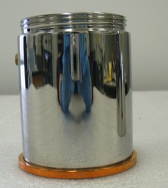Aldo Rossi. <em>Espresso/Coffee Maker and Lid, "La Conica,"</em> Designed 1982. Stainless steel and copper, height: (28.5 cm); diameter: (10.1 cm) (approx). Brooklyn Museum, Gift of Alessi S.p.A., 1999.40.23a-b. Creative Commons-BY (Photo: Brooklyn Museum, CUR.1999.40.23b_view3.jpg)