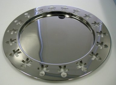 Stefano Giovannoni (Italian, born 1954). <em>Round Tray, 'Girotondo,' Model KKGT</em>, designed 1989–1990. Stainless steel, diameter: (40.0 cm). Brooklyn Museum, Gift of Alessi S.p.A., 1999.40.55. Creative Commons-BY (Photo: Brooklyn Museum, CUR.1999.40.55_view1.jpg)