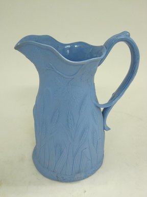 Edward Walley, Villa Pottery (1845-1865). <em>Jug, Ceres Pattern</em>, Patented April 26th 1851. Matte blue stoneware, 7 7/8 x 5 3/4 x 5 1/4 in.  (20.0 x 14.6 x 13.3 cm). Brooklyn Museum, Gift of Gretchen Adkins, 2000.126.4. Creative Commons-BY (Photo: Brooklyn Museum, CUR.2000.126.4_view1.jpg)