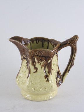  <em>Jug</em>, ca. 1850. Cream and brown stoneware, 5 3/8 x 5 3/8 x 3 3/8 in.  (13.7 x 13.7 x 8.6 cm). Brooklyn Museum, Gift of Gretchen Adkins, 2000.126.8. Creative Commons-BY (Photo: Brooklyn Museum, CUR.2000.126.8_view1.jpg)