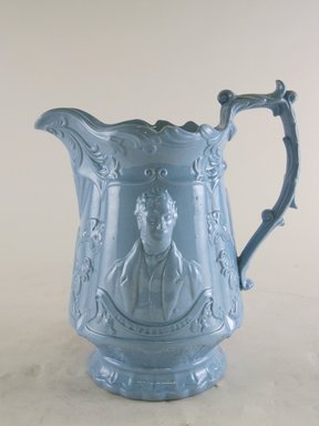  <em>Jug, R. Cobden and R. Peel Pattern</em>, ca. 1839–1846. Blue glazed earthenware, 9 1/8 x 8 1/8 x 5 1/4 in.  (23.2 x 20.6 x 13.3 cm). Brooklyn Museum, Gift of Gretchen Adkins, 2000.126.9. Creative Commons-BY (Photo: Brooklyn Museum, CUR.2000.126.9_view1.jpg)