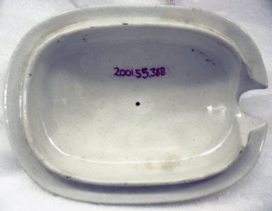  <em>Sauce Boat and Cover</em>, ca. 1840. Glazed earthenware, 2 7/8 x 4 1/8 x 5 3/4 in.  (7.3 x 10.5 x 14.6 cm). Brooklyn Museum, Gift of Paul F. Walter, 2001.55.38a-b. Creative Commons-BY (Photo: Brooklyn Museum, CUR.2001.55.38b_interior.jpg)