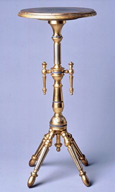 Attributed to George Jacob Hunzinger (American, born Germany, 1835-1898). <em>Stand</em>, ca. 1875. Various woods, gilt, pigment, height: 33 1/8 in. (84.1 cm); diameter: 15 1/8 in. (38.4 cm). Brooklyn Museum, Gift of Robert Tuggle, 2002.17.3. Creative Commons-BY (Photo: Brooklyn Museum, CUR.2002.17.3_view1.jpg)