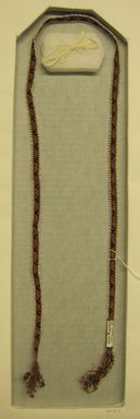 Quechua. <em>Woven Tie (Wato)</em>, 2002. Alpaca fleece, sheep wool, glass(?) beads, natural dyes, 1/2 × 44 1/4 in. (1.3 × 112.4 cm). Brooklyn Museum, Frank Sherman Benson Fund, 2002.62.3. Creative Commons-BY (Photo: Brooklyn Museum, CUR.2002.62.3_view01.jpg)