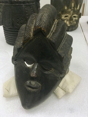 Bassa. <em>Sande society mask (sowei)</em>, late 19th-early 20th century. Wood, pigment, 12 1/2 x 8 x 9 1/2 in. (31.8 x 20.3 x 24.1 cm). Brooklyn Museum, Gift of Josephine Levitt, 2004.108.1. Creative Commons-BY (Photo: , CUR.2004.108.1_threequarter.jpg)