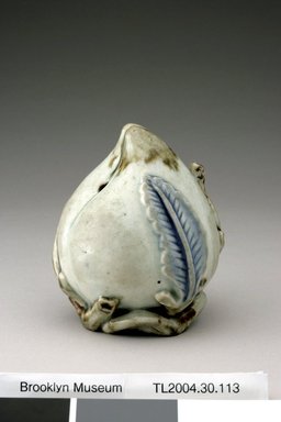  <em>Water Dropper in the Shape of a Peach</em>, last half of 18th century. White porcelain with underglaze iron-brown (on the stem), copper red (on the tip), and cobalt-blue (on the leaves), 3 15/16 in. (10 cm). Brooklyn Museum, The Peggy N. and Roger G. Gerry Collection, 2004.28.131. Creative Commons-BY (Photo: Brooklyn Museum (in collaboration with National Research Institute of Cultural Heritage, , CUR.2004.28.131_view1_Heon-Kang_photo_NRICH.jpg)