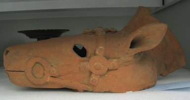  <em>Haniwa Horse Head</em>, 6th-7th century. Red earthenware, 6 1/2 x 7 1/2 x 15 in. (16.5 x 19 x 38.1 cm). Brooklyn Museum, The Peggy N. and Roger G. Gerry Collection, 2004.28.284. Creative Commons-BY (Photo: Brooklyn Museum, CUR.2004.28.284.jpg)