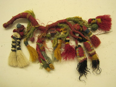 Chimú. <em>Knitted Tassel</em>, 1100-1450. Cotton? camelid fiber?, 5 in. (12.7 cm). Brooklyn Museum, Gift of Victor P. Nunez, 2004.53.38. Creative Commons-BY (Photo: , CUR.2004.53.38.jpg)