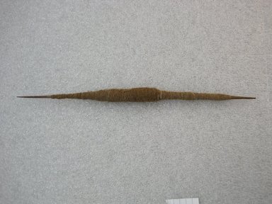 Possibly Chimú. <em>Spindle Wrapped with Yarn</em>, 1100-1450. Wood, cotton, 10 1/2 x 5/8 x 5/8 in. (26.7 x 1.6 x 1.6 cm). Brooklyn Museum, Gift of Victor P. Nunez, 2004.53.41. Creative Commons-BY (Photo: , CUR.2004.53.41_view01.jpg)