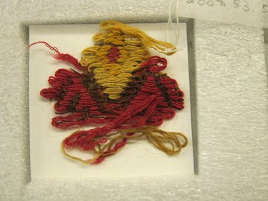 Possibly Chimú. <em>Tapestry Fragment</em>, 1100-1450. Camelid fiber, 1 1/2 x 1 3/4 in. (3.8 x 4.4 cm). Brooklyn Museum, Gift of Victor P. Nunez, 2004.53.52. Creative Commons-BY (Photo: , CUR.2004.53.52_view01.jpg)