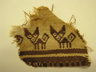 Possibly Chimú. <em>Textile Fragment with Two Cats</em>, 1100-1450. Cotton, 2 1/2 x 3 in. (6.4 x 7.6 cm). Brooklyn Museum, Gift of Victor P. Nunez, 2004.53.55. Creative Commons-BY (Photo: , CUR.2004.53.55.jpg)