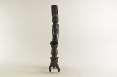 Possibly Tikar. <em>Pipe in the Form of an Elephant</em>, mid-20th century. Copper alloy, wood, 14 x 2 1/2 x 5 3/4 in. (35.6 x 6.4 x 14.6 cm). Brooklyn Museum, Gift of Dorothea and Leo Rabkin, 2004.75.12a-b. Creative Commons-BY (Photo: Brooklyn Museum, CUR.2004.75.12a-b_front_PS5.jpg)