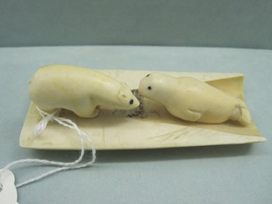 Inuit. <em>Scene with Polar Bear and Seal</em>, 1950-1980. Ivory, bone, pigment, 1 1/4 x 3 5/8 x 1 1/2 in. (3.2 x 9.2 x 3.8 cm). Brooklyn Museum, Hilda and Al Schein Collection, 2004.79.39. Creative Commons-BY (Photo: Brooklyn Museum, CUR.2004.79.39.jpg)