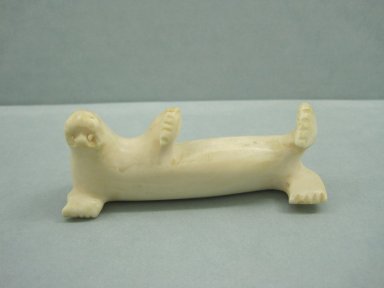Inuit. <em>Walrus with Tusks Missing</em>, 1950-1980. Ivory, 1 1/8 x 3 1/8 x 3/4 in. (2.9 x 7.9 x 1.9 cm). Brooklyn Museum, Hilda and Al Schein Collection, 2004.79.48. Creative Commons-BY (Photo: Brooklyn Museum, CUR.2004.79.48.jpg)