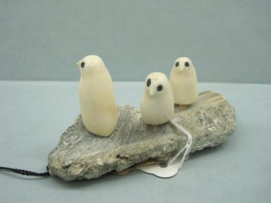 Inuit. <em>Scene with Three Abstract Birds</em>, 1950-1980. Ivory, stone, pigment, wood, 1 3/4 x 3 7/8 x 1 5/8 in. (4.4 x 9.8 x 4.1 cm). Brooklyn Museum, Hilda and Al Schein Collection, 2004.79.57. Creative Commons-BY (Photo: Brooklyn Museum, CUR.2004.79.57.jpg)