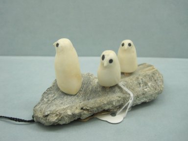 Inuit. <em>Scene with Three Abstract Birds</em>, 1950–1980. Ivory, stone, pigment, wood, 1 3/4 x 3 7/8 x 1 5/8 in. (4.4 x 9.8 x 4.1 cm). Brooklyn Museum, Hilda and Al Schein Collection, 2004.79.57. Creative Commons-BY (Photo: Brooklyn Museum, CUR.2004.79.57.jpg)