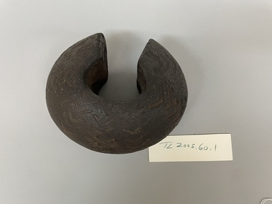 Tutsi. <em>Archer's Bracelet</em>, late 19th century. Wood, copper, 5 x 8 1/4 x 7 1/4 in. (12.7 x 21 x 18.4 cm). Brooklyn Museum, Gift of Francine Farr, 2005.51.1. Creative Commons-BY (Photo: Brooklyn Museum, CUR.2005.51.1_overall01.jpeg)
