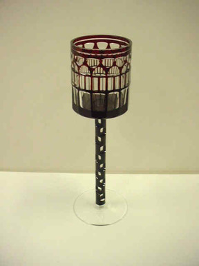 Otto Prutscher (Austrian, 1880–1949). <em>Glass</em>, ca. 1907. Colorless glass overcased with dark red glass, 8 x 2 5/8 in. (20.3 x 6.7 cm). Brooklyn Museum, Gift of Lisa M. Price, 2005.82.12. Creative Commons-BY (Photo: , CUR.2005.82.12-.13_TL2005.90.12c-f.jpg)