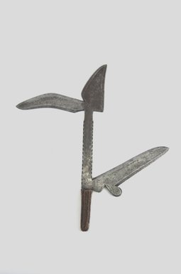  <em>Throwing Knife</em>, 19th century. Iron, fiber, 9 x 17 in. (22.9 x 43.2 cm). Brooklyn Museum, Gift of Dr. Werner Muensterberger and Michael Ward, 2006.66.13. Creative Commons-BY (Photo: Brooklyn Museum, CUR.2006.66.13_PS5.jpg)
