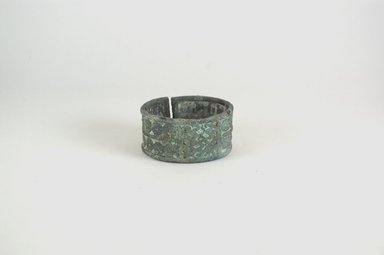  <em>Bracelet</em>. Copper alloy, 1 9/16 x 3 1/8 in. (4 x 8 cm). Brooklyn Museum, Gift of Dr. Werner Muensterberger and Michael Ward, 2006.66.20. Creative Commons-BY (Photo: Brooklyn Museum, CUR.2006.66.20_PS5.jpg)