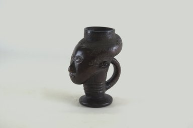 Kuba. <em>Cup</em>, 19th century. Wood, 6 11/16 x 3 15/16 x 5 5/16 in. (17 x 10 x 13.5 cm). Brooklyn Museum, Gift of Michael Ward, 2006.67.30. Creative Commons-BY (Photo: Brooklyn Museum, CUR.2006.67.30_threequarter_PS5.jpg)