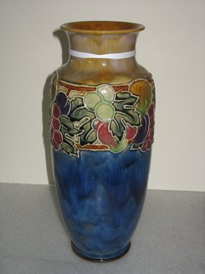 Doulton Pottery (1815–present). <em>Vase</em>, 1923–1927. Glazed earthenware, 14 x 5 1/2 x 5 1/2 in. (35.6 x 14 x 14 cm). Brooklyn Museum, Gift of the Estate of Dr. Eleanor Z. Wallace, 2007.41.2. Creative Commons-BY (Photo: Brooklyn Museum, CUR.2007.41.2.jpg)