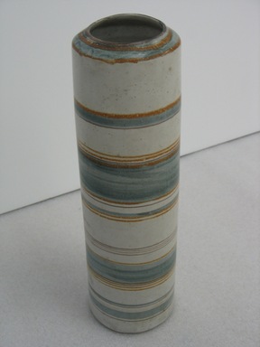 Glidden Pottery (1940-1957). <em>Vase, Sandstone Artware</em>, 1952-1957. Glazed earthenware, 15 1/4 x 4 1/8 in. (38.7 x 10.5 cm). Brooklyn Museum, Gift of Paul F. Walter, 2007.62.17. Creative Commons-BY (Photo: Brooklyn Museum, CUR.2007.62.17_view2.jpg)