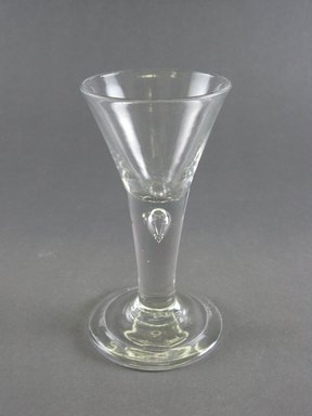  <em>Drinking Vessel</em>, ca. 1730. Colorless glass, 5 1/2 x 3 1/8 in. (14 x 7.9 cm). Brooklyn Museum, Gift of Wunsch Foundation, Inc., 2008.20.2. Creative Commons-BY (Photo: Brooklyn Museum, CUR.2008.20.2.jpg)