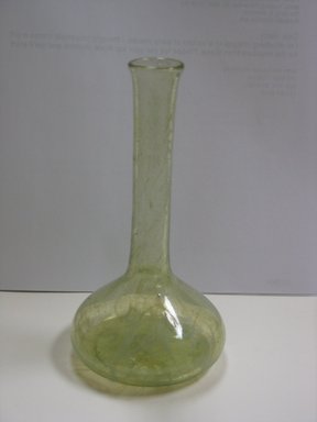 Christopher Dresser (English, 1834–1904). <em>Clutha Vase</em>, ca. 1888. Glass, 6 1/16 x 3 3/16 in. (15.4 x 8.1 cm). Brooklyn Museum, Gift of Leah and David Roland, 2009.11. Creative Commons-BY (Photo: Brooklyn Museum, CUR.2009.11.jpg)