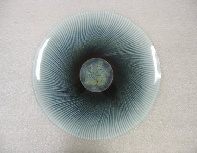 Maurice Heaton (American, born Switzerland 1900–1990). <em>Plate</em>, ca. 1965. Glass, height: 5/8 in. (1.6 cm); diameter: 13 3/4 in. (34.9 cm). Brooklyn Museum, Gift of Janice Gottesman in honor of Joan Nissman and Morton Abromson, 2009.50. Creative Commons-BY (Photo: Brooklyn Museum, CUR.2009.50.jpg)