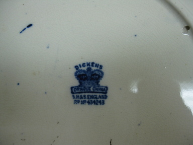 The Rowland & Marsellus Company (1893-1938). <em>Charles Dickens Plate</em>, Registered 1904, Made: early 20th century. Glazed earthenware, 1 1/8 x 11 in. (2.9 x 27.9 cm). Brooklyn Museum, Gift of Pat Nichols in honor of Joanne Leshen, 2009.77.1. Creative Commons-BY (Photo: Brooklyn Museum, CUR.2009.77.1_mark.jpg)