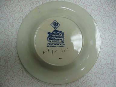 The Rowland & Marsellus Company (1893-1938). <em>Souvenir of Montreal Plate</em>, early 20th century. Glazed earthenware, 1 1/8 x 11 in. (2.9 x 27.9 cm). Brooklyn Museum, Gift of Pat Nichols in honor of Joanne Leshen, 2009.77.2. Creative Commons-BY (Photo: Brooklyn Museum, CUR.2009.77.2_back.jpg)