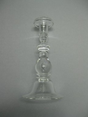 Steuben Glass, a division of Corning Glass Works, 1903-2011. <em>Teardrop Candlestick, model 7792</em>, Designed 1937, manufactured 1937-2002. Colorless glass, 8 3/4 x 4 1/2 in. (22.2 x 11.4 cm). Brooklyn Museum, Gift of The American College in memory of Charles J. Zimmerman, CLU®, 2010.14.2. Creative Commons-BY (Photo: Brooklyn Museum, CUR.2010.14.2.jpg)