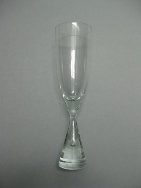 Bent Severin (Danish, 1925–2012). <em>Champagne Flute, Princess Pattern</em>, designed 1957, manufactured 1958–1984. Glass, height: 8 1/2 in. (21.6 cm); diameter: 2 5/16 in. (5.9 cm). Brooklyn Museum, Gift of The American College in memory of Charles J. Zimmerman, CLU®, 2010.14.3. Creative Commons-BY (Photo: Brooklyn Museum, CUR.2010.14.3.jpg)